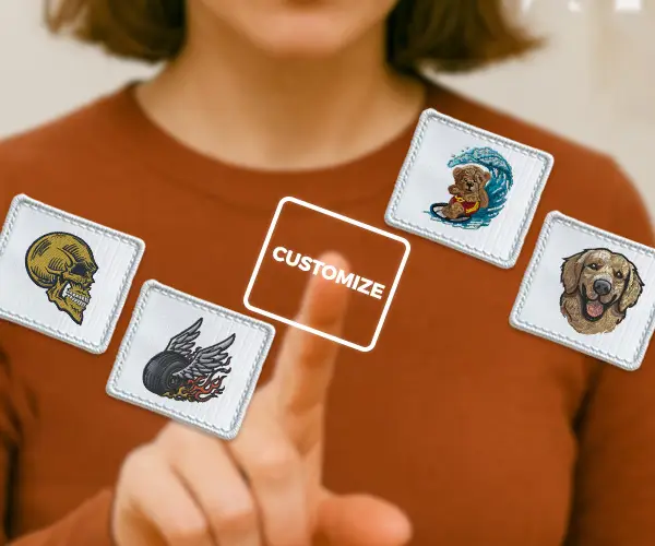 A woman selecting from floating embroidered patch designs—featuring a skull, winged tire, surfing bear, and dog—centered around a glowing “CUSTOMIZE” button, representing Dhaga-Raga’s mix-and-match customization feature to create your own unique product