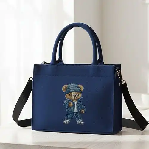 Embroidered Blue Handbag With Beanie Bear Design