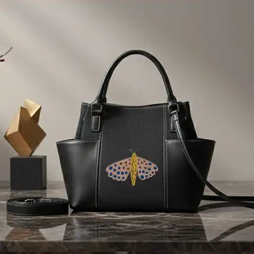 Embroidered Bucket Handbag With Mystic Moth Design