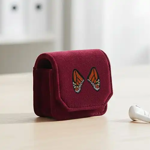 Embroidered Earphone Cover With Monarch Wing Design