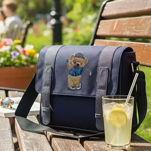 Embroidered Messagener Bag With Junior Golfer Bear Design