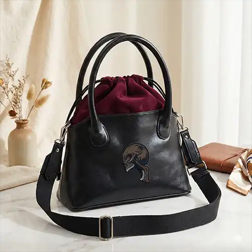 Embroidered Bucket Handbag With Sinister Skull Design