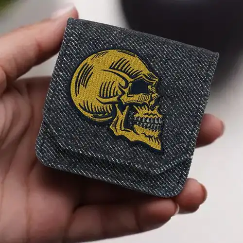 Embroidered Earphone Cover With Golden Reaper Design