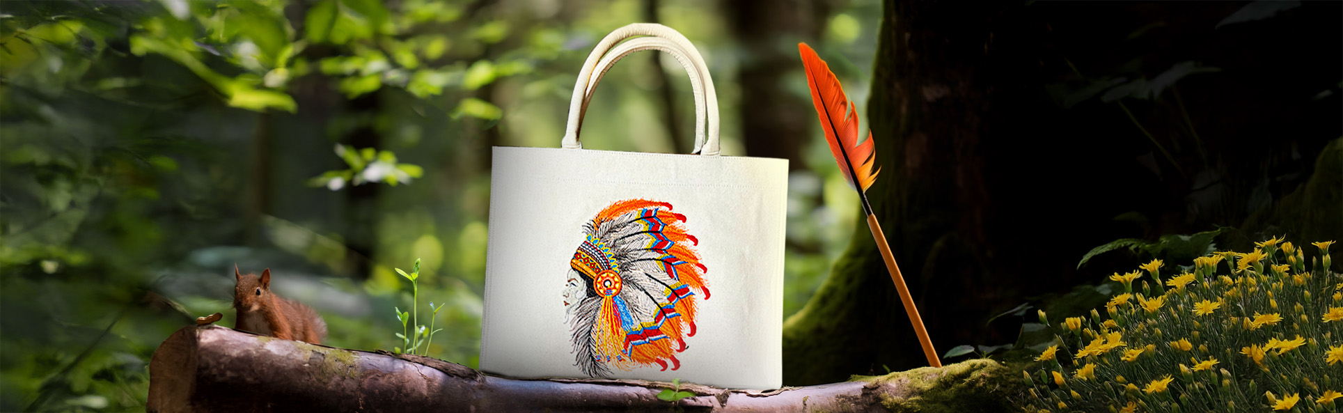 Embroidered fabric bag featuring tribal artwork displayed in a natural forest setting with a feather and a squirrel